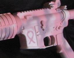Machine gun with breast cancer awareness logo